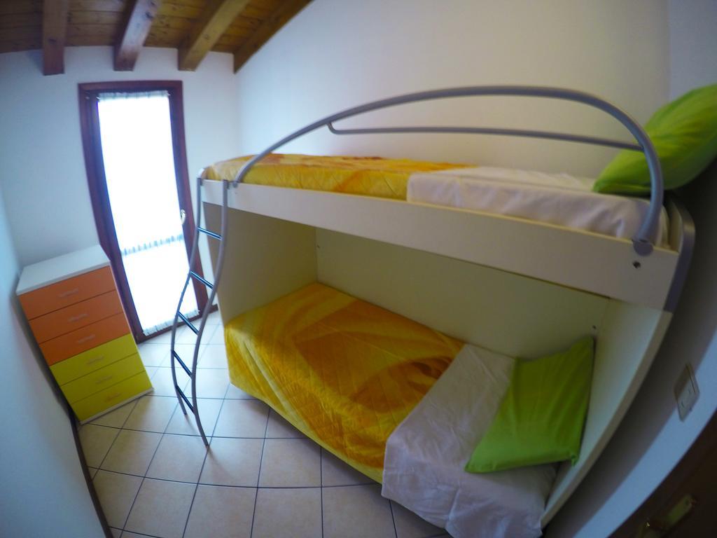 Residence Pineta - Agenzia Cocal Каорле Номер фото